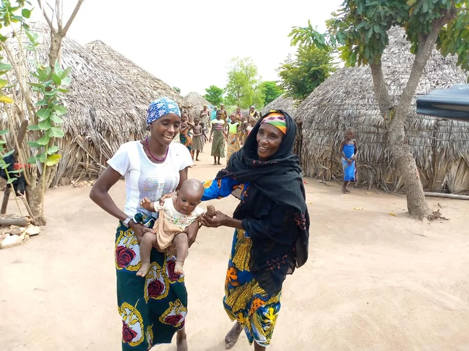  These two laughingly offered us this baby! Of course they weren't serious! It was just for fun! 