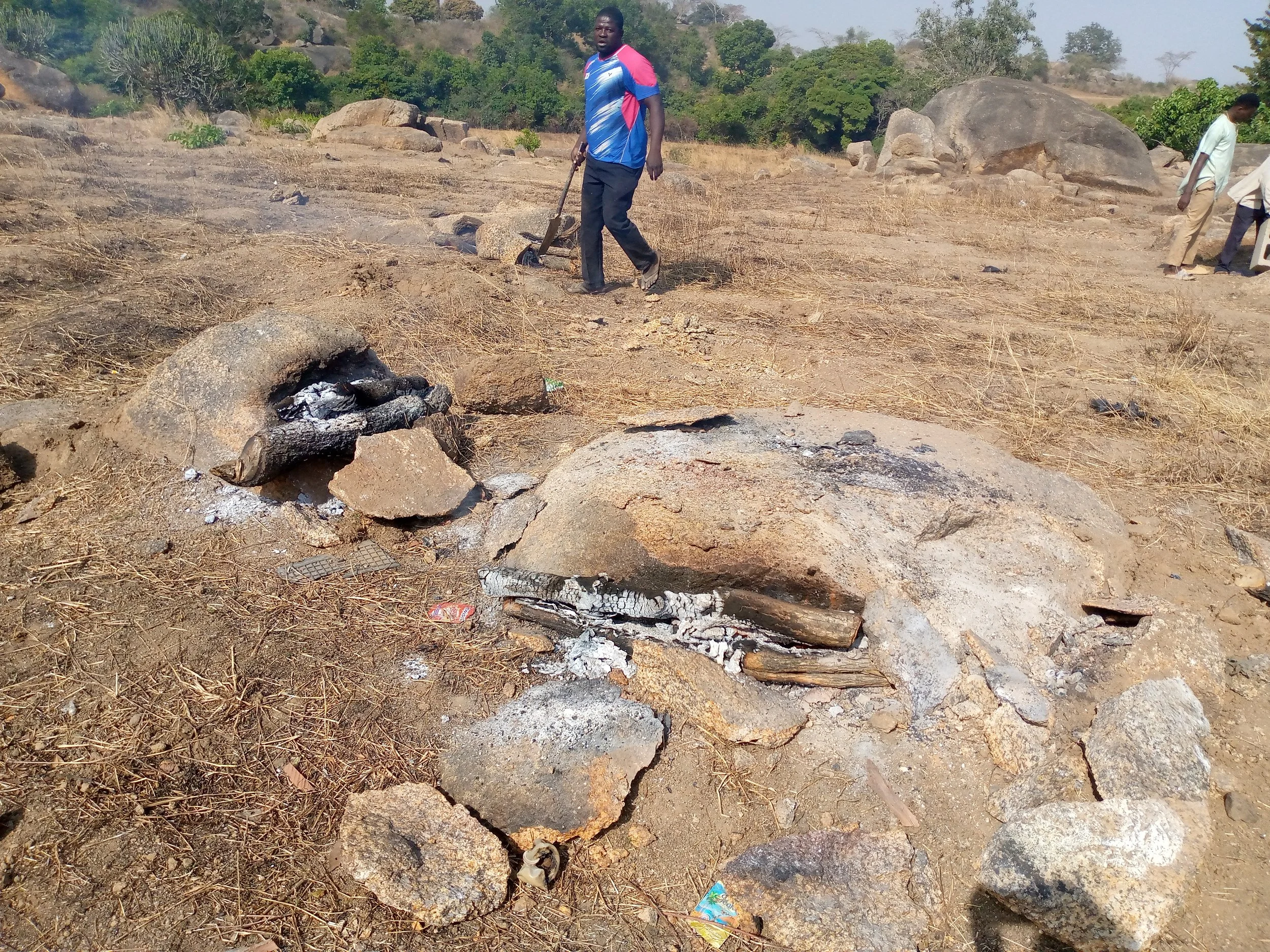  One big challenge is heating, breaking and removing the big rocks within the church area. We will use the broken stones as foundation fillers. The weather is cool, and spirits are high! God be praised! 