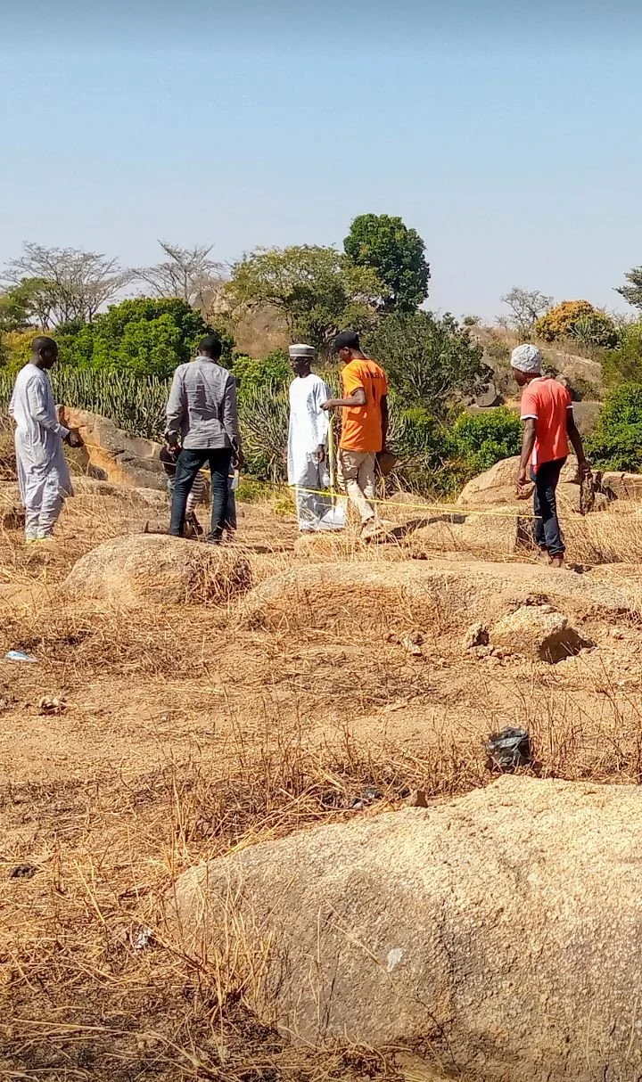  The workers are measuring out the foundation, to start digging! 