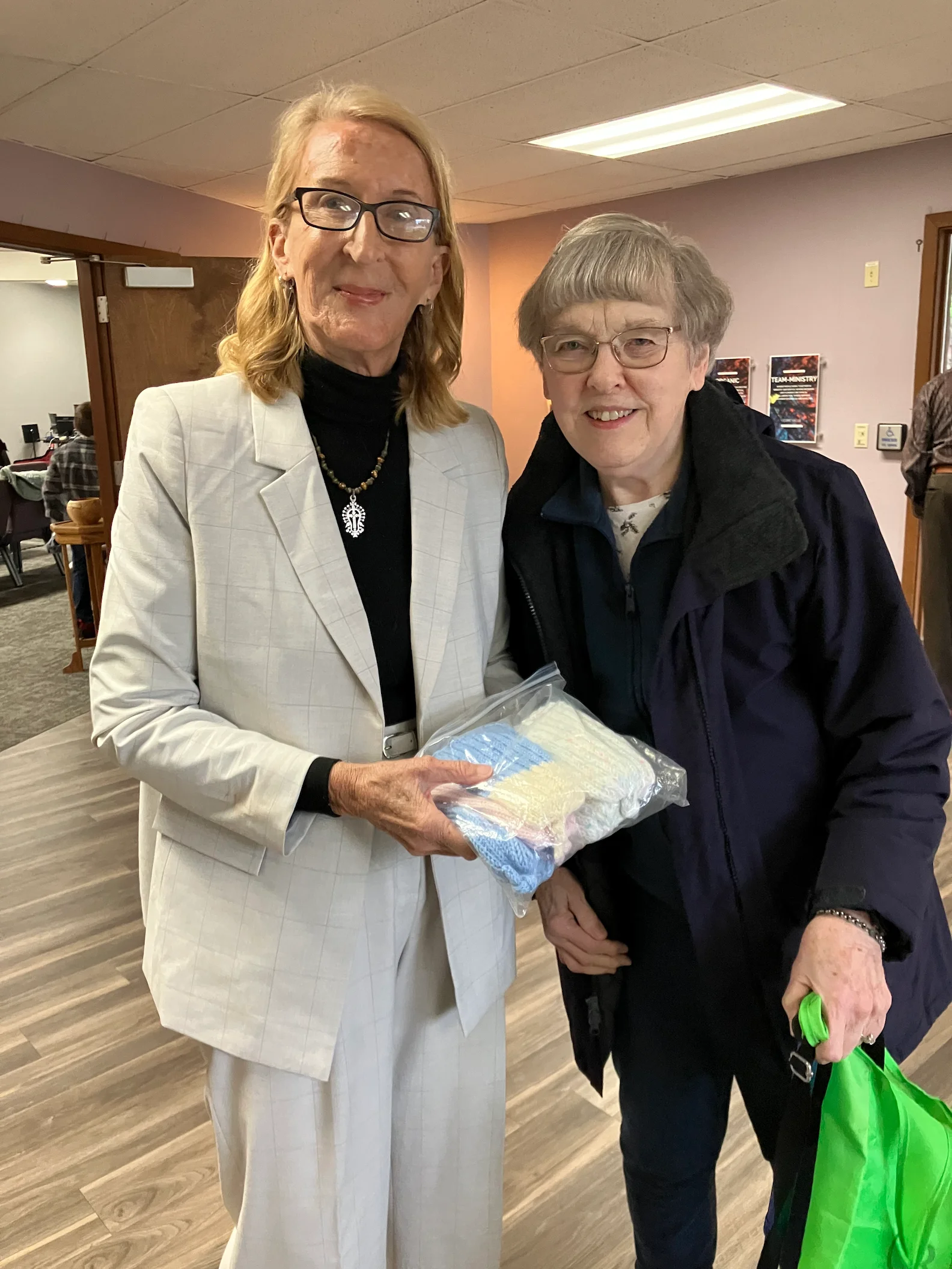 Friend Carol Schaper, Shoreline FMC, brought baby hats, knitted by a friend, for Phyllis to take home to Nigeria! 