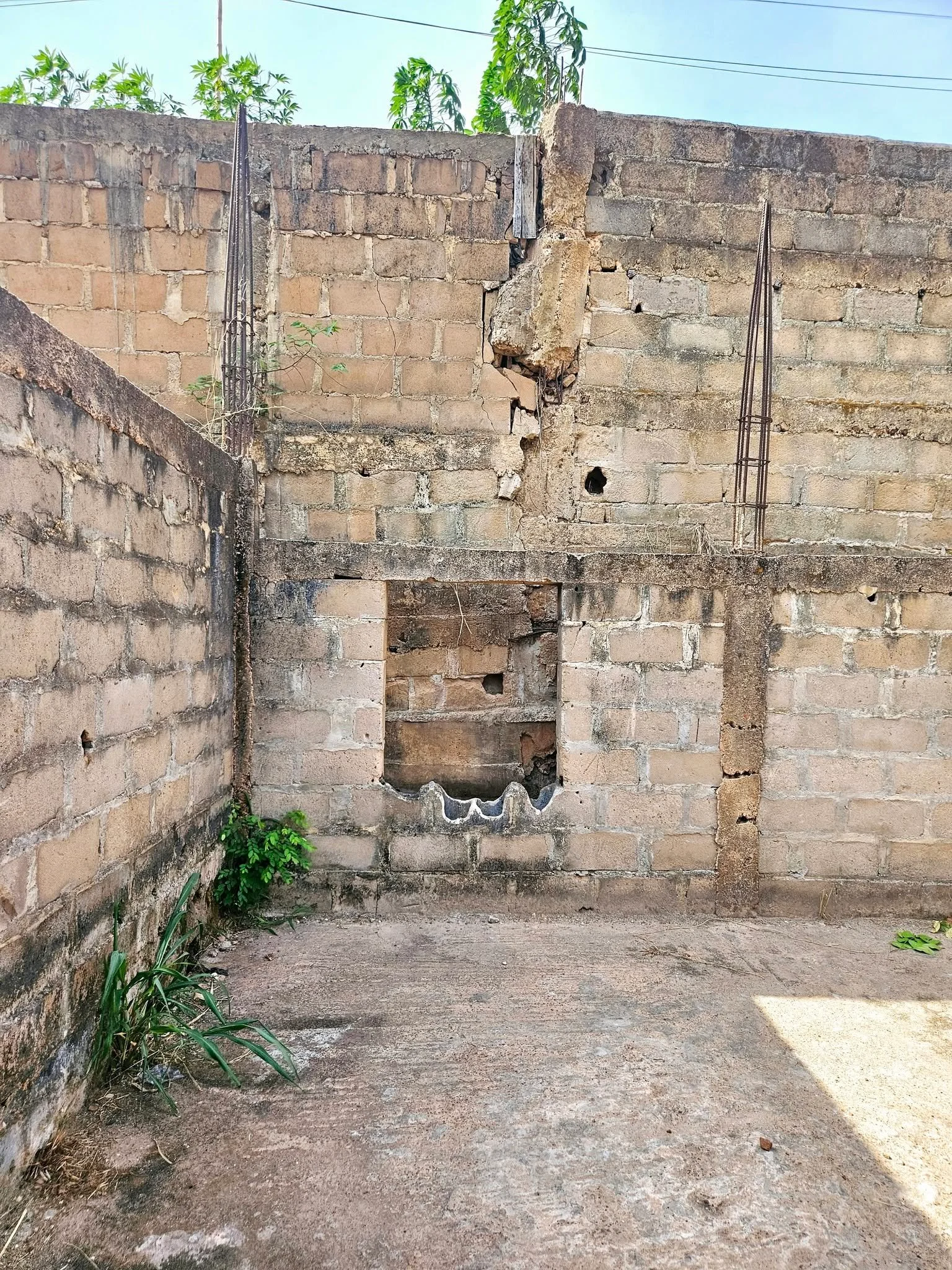  The first thing we have to do is bring down an old retaining wall, which would eventually fall in and damage the NEW work we will do! 