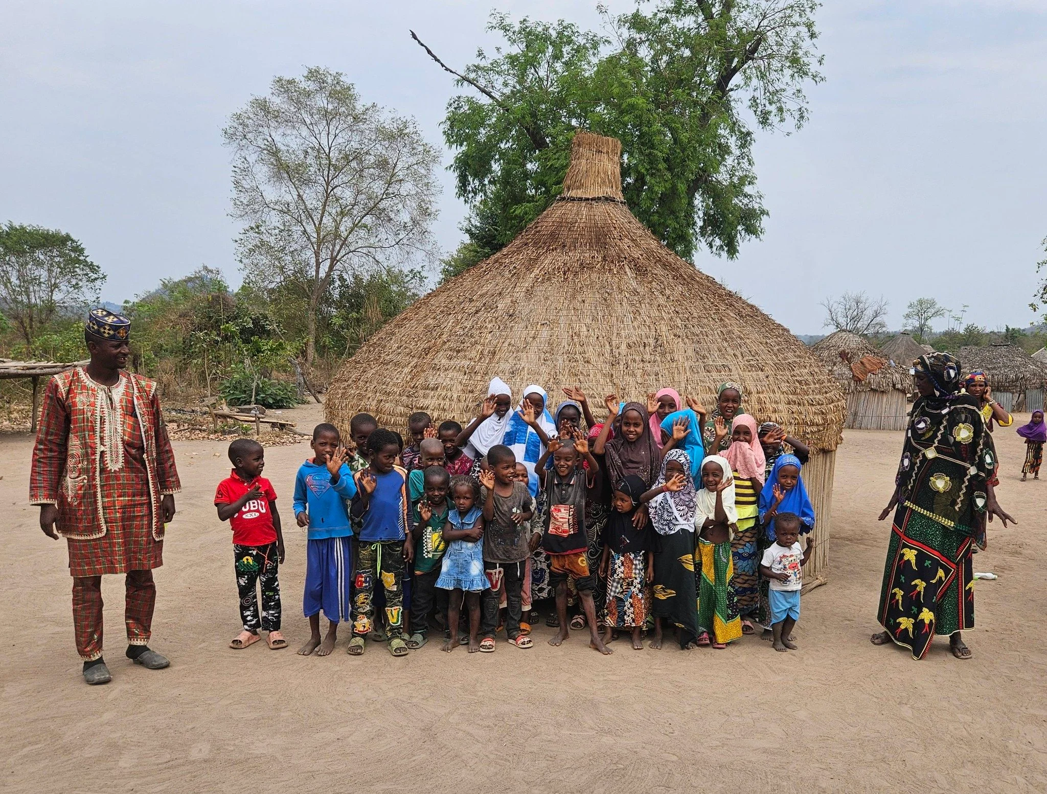  Here are lots of beautiful children! Their lovely village is clean and inviting! Want to visit? :) 